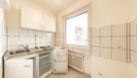 Küche - Charmante 1-Zimmer-Wohnung mit Loggia